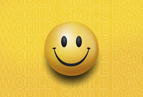 Smile che ride su fondo giallo